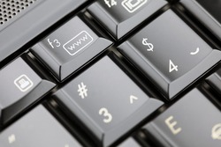 Closeup of laptop keyboard. Emphasis om www button. Shallow depth of field. Studio work.