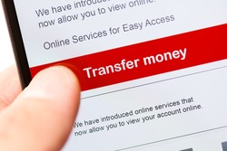smartphone touch screen with red button transfer money. business e-commerce concept.