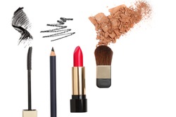 Cosmetic products isolated on white. Red lipstick, black mascara brush, eyeliner, face powder crushed, brush