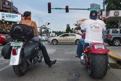 Sturgis, South Dakota - August 8, 2014: Two riders stopped at a red light in the city of Sturgis, in South Dakota, USA, during the annual Sturgis Motorcycle Rally