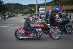Sturgis, South Dakota - August 8, 2014: Rider in a street of the city of Sturgis, in South Dakota, USA, during the annual Sturgis Motorcycle Rally