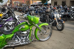 Sturgis, South Dakota - August 8, 2014: Riders in the main street of the city of Sturgis, in South Dakota, USA, during the annual Sturgis Motorcycle Rally