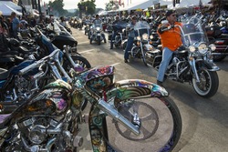 Sturgis, South Dakota - August 9, 2014: Riders in the main street of the city of Sturgis, in South Dakota, USA, during the annual Sturgis Motorcycle Rally