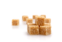 Brown Sugar cubes isolated with soft shadow. Fucus limited.