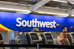 Indianapolis - Circa July 2017: Southwest Airlines Check In desk preparing passengers for departure. Southwest is the largest low-cost carrier in the world III