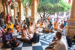 Holiday Kirtan chants in the interior of ISKCON temple Krishna Balarama in Vrndavana. India, Vrindavan, November 2016