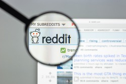 Milan, Italy - August 10, 2017: Reddit website homepage. It is an American social news aggregation, web content rating, and discussion website. Reddit logo visible.