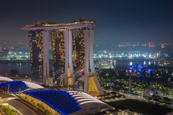 Singapore cityscape at dusk. Landscape of Singapore business building around Marina bay. Modern high building in business district area at twilight.