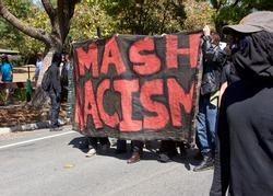 Berkeley, CA - August 27, 2017: Unidentified participants at the NO TO MARXISM IN AMERICA rally in Martin Luther King Jr. Civic Center Park, more counter-protesters than protesters.