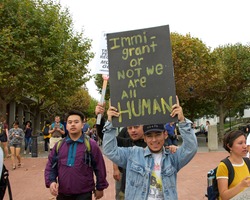 Berkeley, CA - September 05, 2017: Unidentified participants protesting Trump rescinding DACA,. Approximately 200 demonstrators gathered in UC Berkeley’s Sproul Plaza and marched down Telegraph Avenue