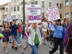 Berkeley, CA - September 05, 2017: Unidentified participants protesting Trump rescinding DACA,. Approximately 200 demonstrators gathered in UC Berkeley’s Sproul Plaza and marched down Telegraph Avenue