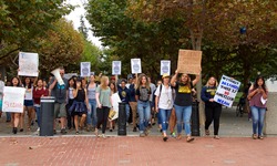 Berkeley, CA - September 05, 2017: Unidentified participants protesting Trump rescinding DACA,. Approximately 200 demonstrators gathered in UC Berkeley’s Sproul Plaza and marched down Telegraph Avenue