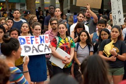 Berkeley, CA - September 05, 2017: Unidentified participants protesting Trump rescinding DACA,. Approximately 200 demonstrators gathered in UC Berkeley’s Sproul Plaza and marched down Telegraph Avenue