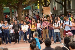 Berkeley, CA - September 05, 2017: Unidentified participants protesting Trump rescinding DACA,. Approximately 200 demonstrators gathered in UC Berkeley’s Sproul Plaza and marched down Telegraph Avenue