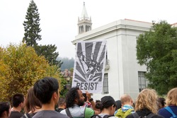 Berkeley, CA - September 05, 2017: Unidentified participants protesting Trump rescinding DACA,. Approximately 200 demonstrators gathered in UC Berkeley’s Sproul Plaza and marched down Telegraph Avenue