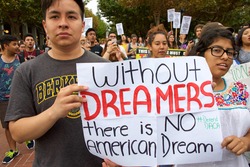 Berkeley, CA - September 05, 2017: Unidentified participants protesting Trump rescinding DACA,. Approximately 200 demonstrators gathered in UC Berkeley’s Sproul Plaza and marched down Telegraph Avenue