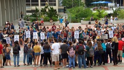 Berkeley, CA - September 05, 2017: Unidentified participants protesting Trump rescinding DACA,. Approximately 200 demonstrators gathered in UC Berkeley’s Sproul Plaza and marched down Telegraph Avenue