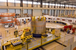 PROVENCE, FRANCE - JULY 31, 2017: ITER PF Coils Winding facility building, ITER, International Fusion Energy Organization. Conductor spool, center.