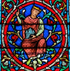 Stained glass window in the Notre Dame Cathedral in Paris depicting an ancestor of Jesus Christ, as part of the Tree of Jesse.
