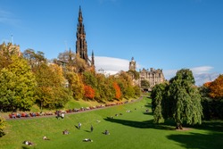 People enjoying the autumn sun in Edinburgh's famous 'Princess Street Gardens' in mid October.