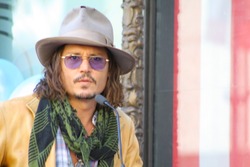 HOLLYWOOD - APRIL 1: Actor Johnny Depp at the Walk of Fame ceremony for Penelope Cruz April 1, 2011 Hollywood, CA.