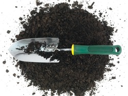 Garden soil and implements isolated against a white background