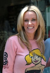 Jenny McCarthy enjoying day with friend at Kidson's. The two goofed off while waiting for there car from the valet in Beverly Hills, Ca , Los Angeles, Ca, 05/21/04