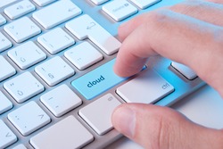 Cloud computing concept - computer keyboard with cloud button