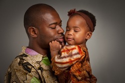 Happy African American Father Holding Baby Girl Portrait Isolated on Grey Background