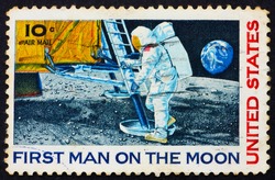 UNITED STATES OF AMERICA - CIRCA 1969: a stamp printed in the United States of America shows Man?s 1st landing on the moon, Apollo 11, circa 1969