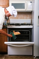 a world famous chef prepares one of his famous dishes for someone while in his kitchen at a world famous bed and breakfast hotel restaurant.