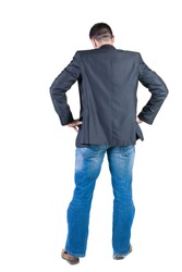young expert looks ahead. rear view. Isolated over white .