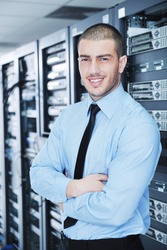 young handsome business man engineer in datacenter server room