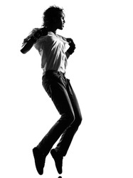 full length silhouette of a young man dancer dancing funky hip hop r&b on isolated studio white background