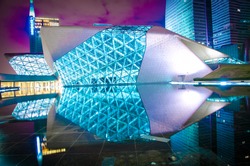 GUANGZHOU, CHINA - NOV. 05: Guangzhou Opera House night landscape on Nov. 05, 2011 in Guangzhou, China. Designed by architect Zaha Hadid and has become one of the seven new landmarks in Guangzhou