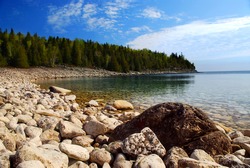 Clear waters of Georgian Bay at Bruce peninsula Ontario Canada, focus on foreground