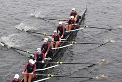 BOSTON - OCTOBER 23: TBC Racing youth womens Eights races in the Head of Charles Regatta. Oakland Strokes won with a time of 17:12 on October 23, 2011 in Boston, MA.