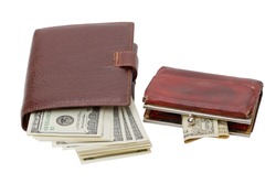 Wallet with a bunch of dollars and an old purse with a dollar. Isolated on white background