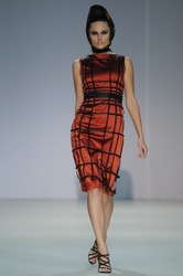 MOSCOW - OCTOBER 31: Model walks runway at the Arsenicum Collection for Spring/ Summer 2012 during Volvo Fashion Week on October 31, 2011 in Moscow, Russia