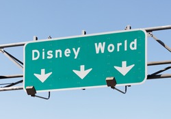 ORLANDO - DECEMBER 22: A sign in Orlando, FL points to the Walt Disney World Resort on December 22, 2011. With more than 47 million visitors in 2010, it is world's most visited entertainment resort.