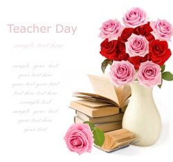 Teacher day (still life with bunch of pink and red roses and books isolated on white)