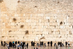 JERUSALEM, ISRAEL - JANUARY 23: Jewish worshipers pray at the Wailing Wall. The most holy site for Jews. January 23, 2011 in Jerusalem, Israel.
