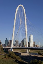 New Margaret Hunt Hill Bridge crossing Trinity River in Dallas, Texas. The bridge unique design of a 400-foot steel arch and cables to support the bridge. The bridge will open in 2012.