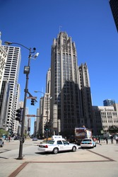 CHICAGO - APRIL 26: Busy street scene near Tribune Building on April 26, 2010 in Chicago, Illinois. The Windy City is the third largest city in the U.S. and is a worldwide center of commerce.