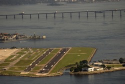 RIO DE JANEIRO, BRAZIL - FEBRUARY 4: TAM Airlines aircraft prepare for landing, February 4, 2012, Rio de Janeiro, Brazil. TAM is a new airline born after the national airline Varig went to bankrupt.