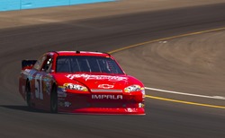 AVONDALE, AZ - MAR 03: Kurt Busch (51) brings his car through turn 4 during the Subway Fresh Fit 500 race at the Phoenix International Raceway in Avondale, AZ on Mar 03, 2012.