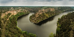 Nature rainy landscape of Las Hoces del Duraton Segovia, Spain. River meander between cliffs and pines. Panorama of natural park.