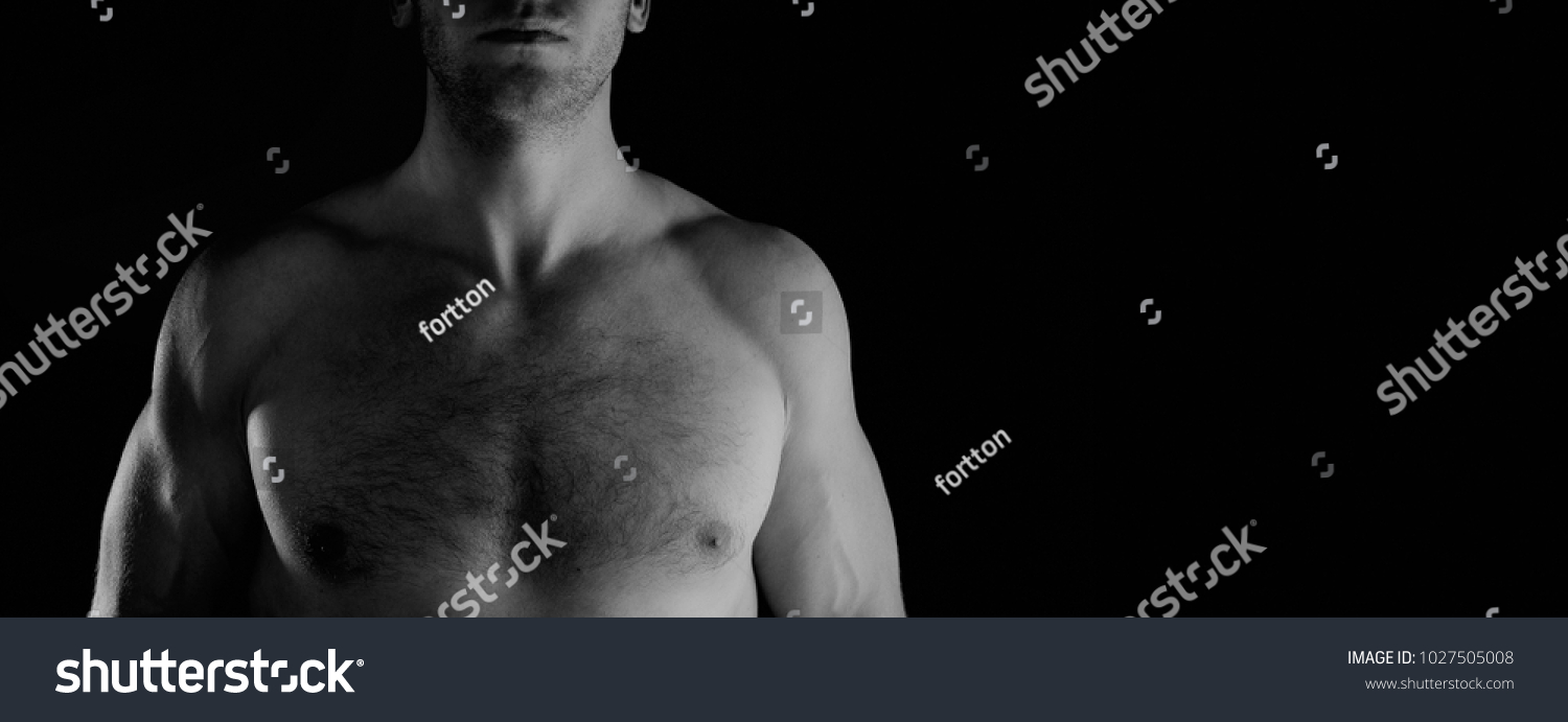 Male Athletes Torso On Black Background Stock Photo 1027505008