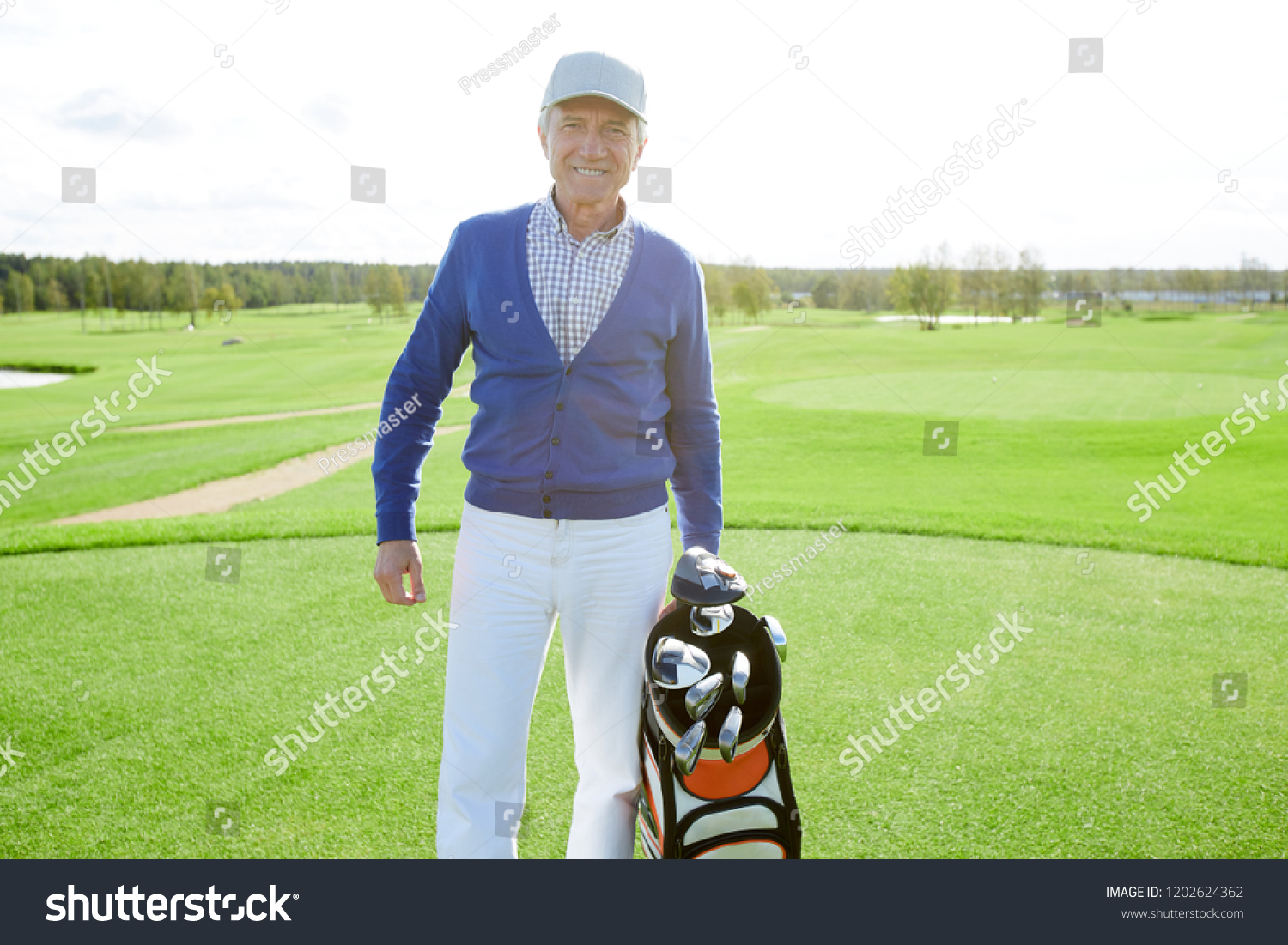 Smiling Mature Golf Player Clubs Standing Stock Photo 1202624362