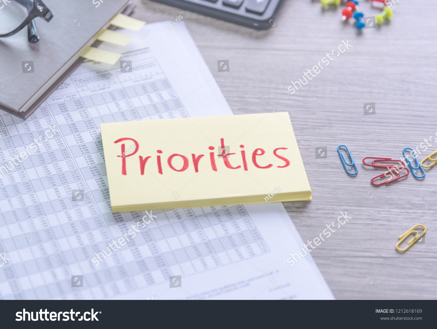 Priorities Reminder Handwriting On Sticky Note Stock Photo